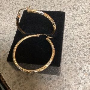 14 kt gold hoop earrings.